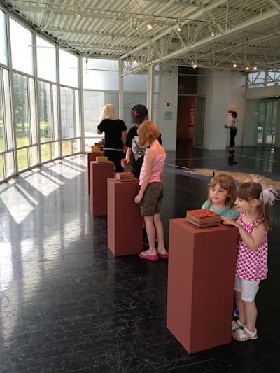 kids looking at art