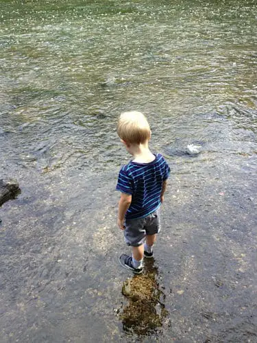 boy in creek