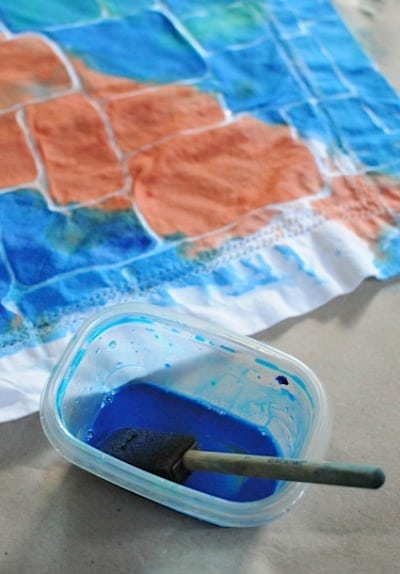 Glue batik project- using washable gel glue and paint on napkins to make school lunch reusable napkins- how eco-friendly! Artchoo.com