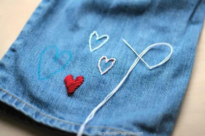 A DIY for embroidering hearts on jeans- from Tiny Rotten Peanuts