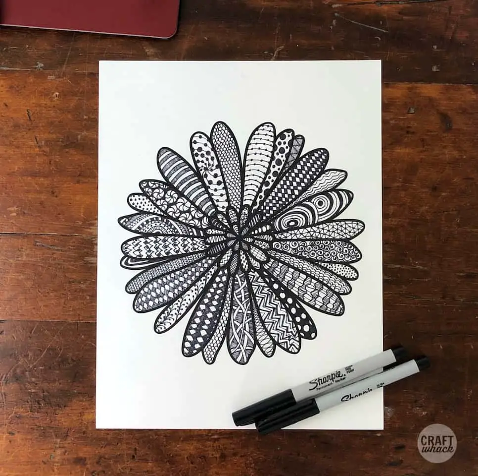 printed flower with zentangle doodles drawn in the petals