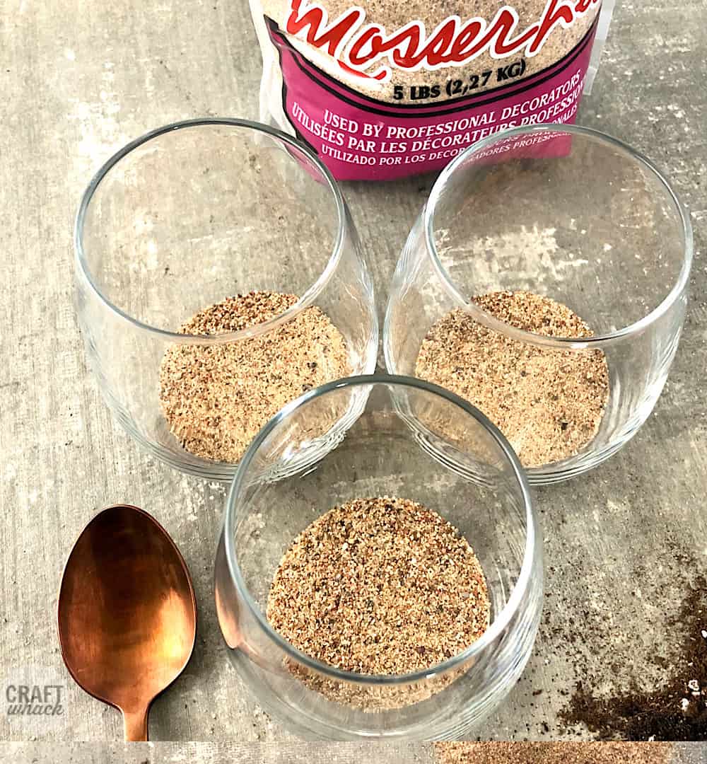 sand in wine glass to make succulent planters