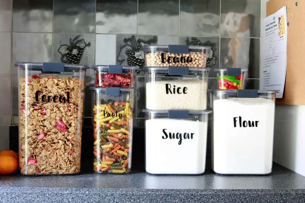 vinyl cricut labels on pantry containers
