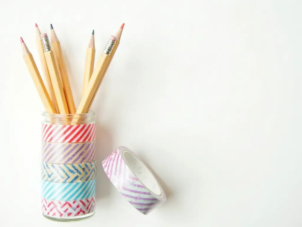 Pencils and a desk cup decorated with washi tape
